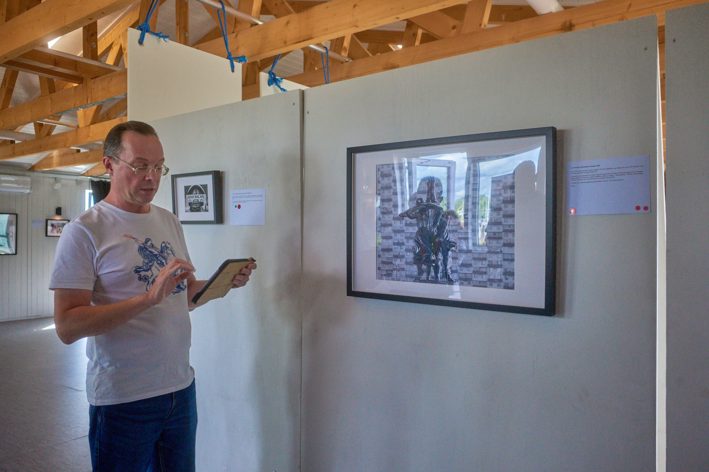 Alexander Gubsky in front of the exhibition pictures