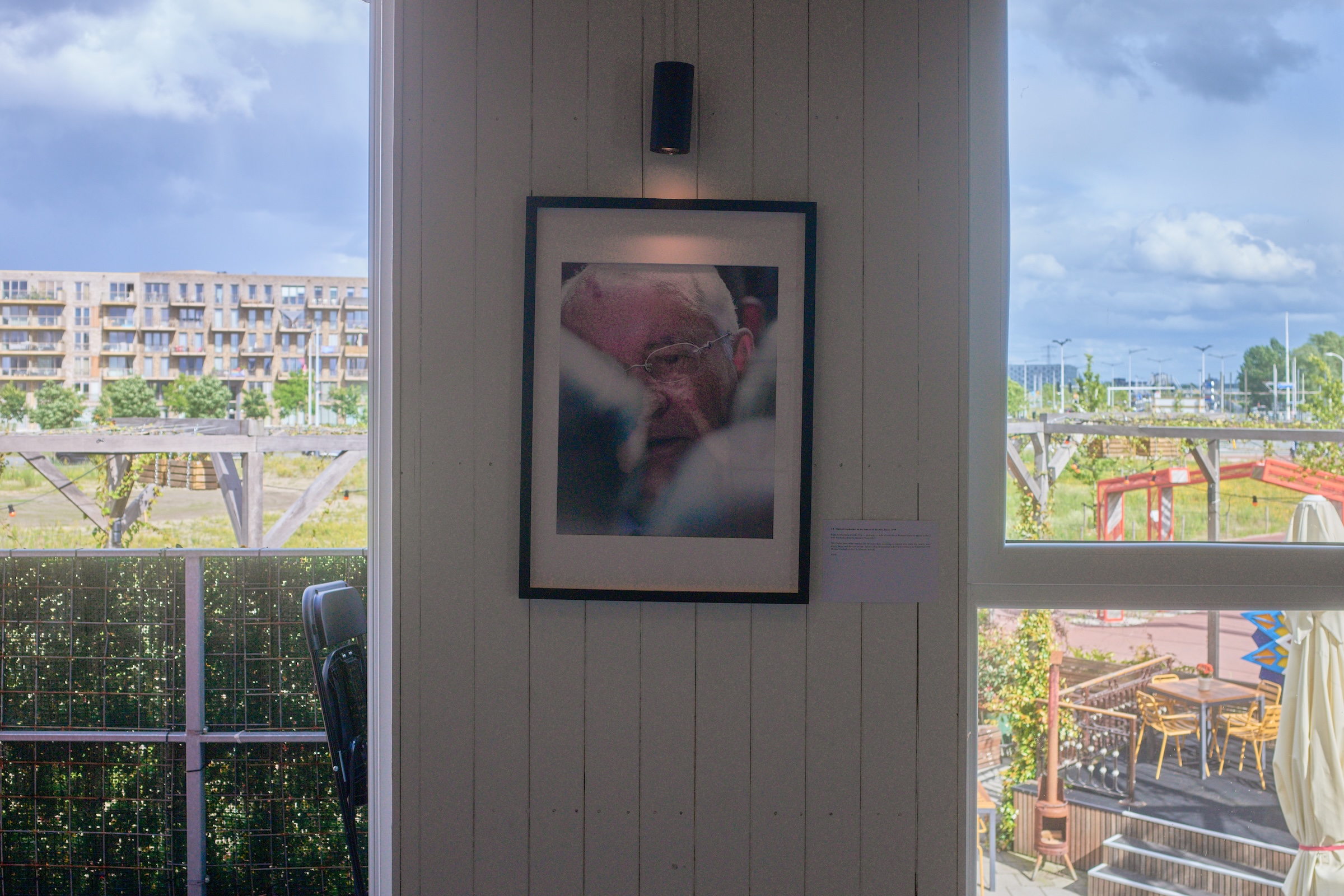 A portrait of Mikhail Gorbachev framed on the wall