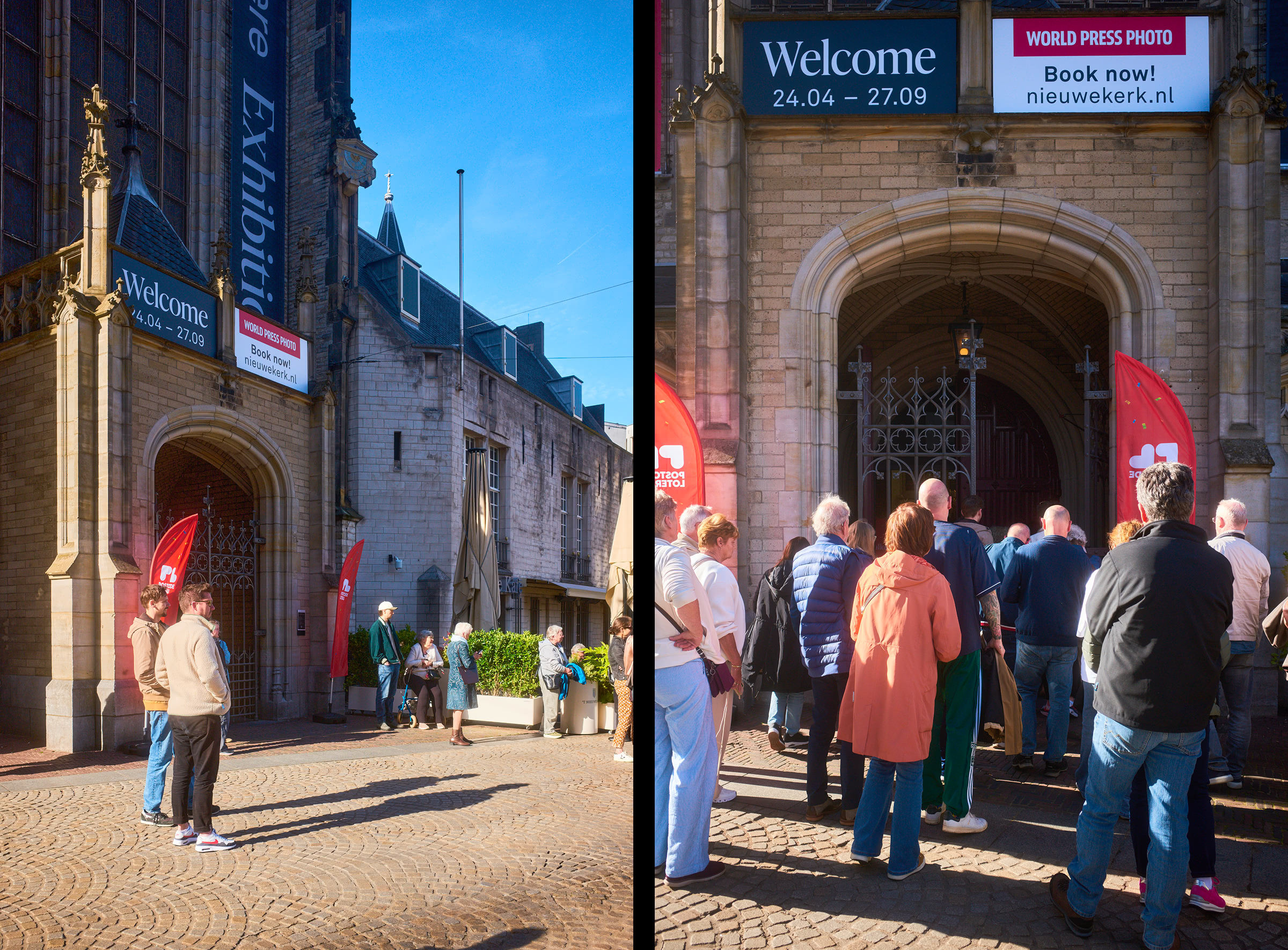A group of people stand in front of an ornate arched doorway, some looking at a display. The building is a light beige color with a red sign World Press Photo. Clear sky above.